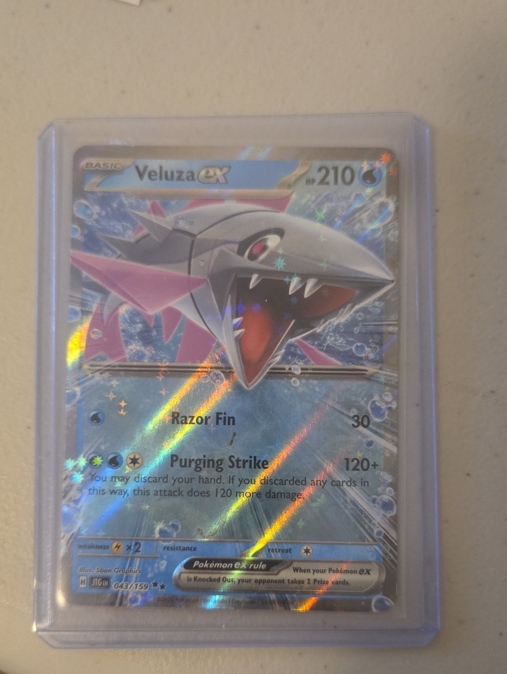 Pokemon Veluza GX Holographic Card - Blue/Pink